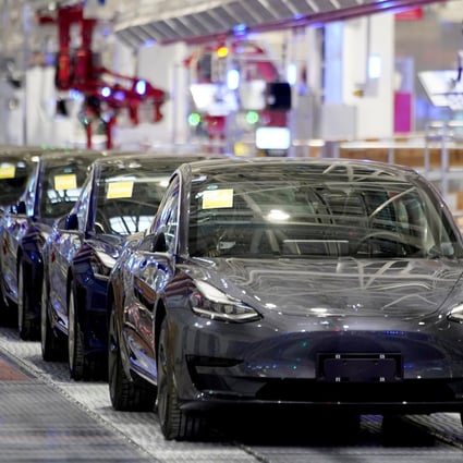Tesla’s China-made Model 3 vehicles during a delivery event at its factory in Shanghai on January 7, 2020. Photo: Reuters.