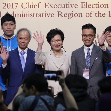 Carrie Lam, husband Lam Siu-por (left) and son Jeremy Lam Tsit-sze (right) meet the media after she won the chief executive race in March 2017. Photo: Sam Tsang