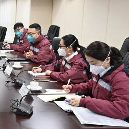 Mainland epidemiological experts exchange views with Hong Kong government officials in a meeting on February 20. A team of mainland China’s top epidemiologists arrived in Hong Kong last week to inspect Hong Kong’s anti-pandemic arrangements and advise the local government. Photo: Xinhua