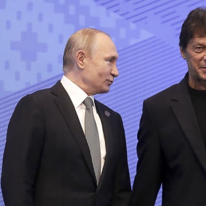 Russia’s President Vladimir Putin (L) and Pakistan’s Prime Minister Imran Khan pose for a photo in June 2019. Photo: TASS via Getty Images