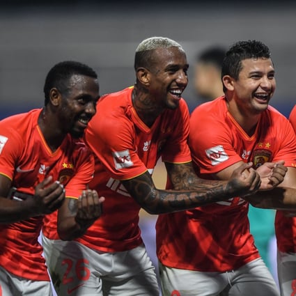 (From left) Fernando Fei Nanduo, Anderson Talisca, Elkesen Ai Kesen, and Paulinho in a game for Guangzhou Evergrande Taobao against Shanghai Greenland Shenhua in the postponed Chinese Football Association Super League (CSL) season in the Dalian Division in 2020. Photo: Xinhua   