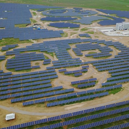 Solar panels arranged to resemble the likeness of a giant panda at the Datong Panda Power Plant in northern China’s Shanxi province on 25 July 2017. Photo: EPA