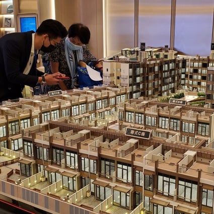 Potential buyers viewing an apartment model at the sales office of the #LYOS housing project at CK Asset Holding’s sales office in Hung Hom on 4 November 2021. Photo: Edmond So