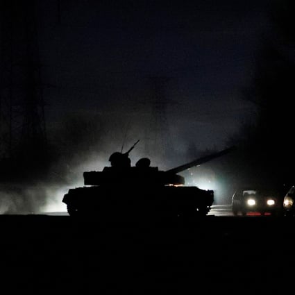 A tank drives along a street after Russian President Vladimir Putin ordered the deployment of Russian troops to two breakaway regions in eastern Ukraine following the recognition of their independence. Photo: Reuters