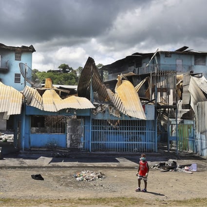 A looted street in Honaria, the Solomon Islands capital, after last year’s riots. Photo: AP