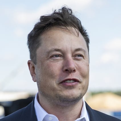 Elon Musk talks to the press as he arrives at the construction site of a Tesla Gigafactory near Berlin in 2020. Photo: TNS 