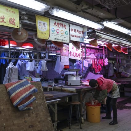 An employee at a fresh beef stall in Cheung Sha Wan on Saturday. The shortage of fresh meat has forced residents to buy frozen products instead. Photo: Yik Yeung-man