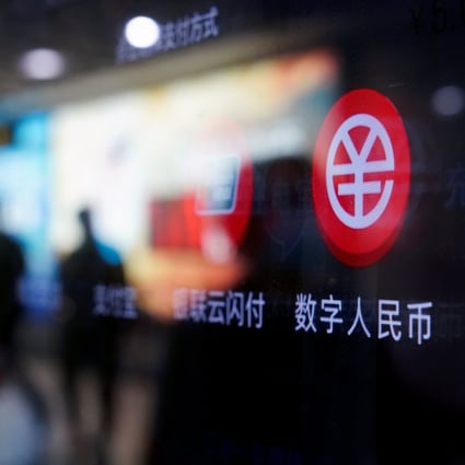 A sign indicating the digital yuan on a vending machine at a subway station in Shanghai in 2021. Photo: Reuters