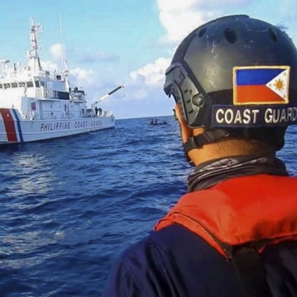 A Philippine coastguard ship patrols near Whitsun Reef in the South China Sea last year. Photo: Philippine Coast Guard Handout via AP