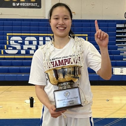 Hong Kong women’s basketball player Yannie Chan Yan-man with the GNAC Championship trophy after Emmanuel College beat Saint Joseph’s in the final in the US. Photo: Instagram / Yannie Chan   