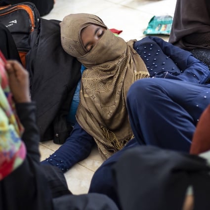 Ethnic Rohingya people rest at a temporary shelter in Bireuen, Aceh province. Photo: AP