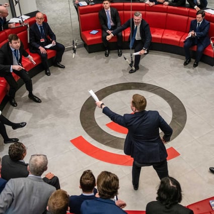 Traders, brokers and clerks on the trading floor of the open outcry pit at the London Metal Exchange, on February 28, 2022. Photo: Bloomberg