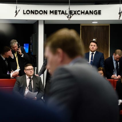 A file photo of traders at the  London Metal Exchange. A majority of the new loans will be used for margin calls on Tsingshan’s existing positions on the exchange. Photo: AFP