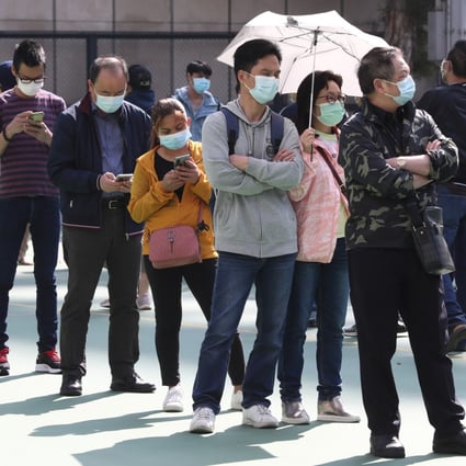 People queue for Covid-19 testing at a mobile specimen collection station in Mong Kok earlier this month. Photo: Jonathan Wong