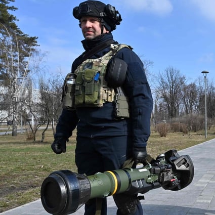 Ukrainian Territorial Defence Forces examine new weapons in Kyiv on Wednesday amid Russia’s ongoing invasion of Ukraine. Photo: AFP