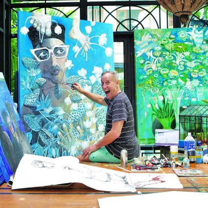 Bill Bensley in his painting studio at home in Bangkok, Thailand. The renowned luxury hotel designer is now embarking on a project in the Democratic Republic of Congo that combines luxury hospitality with conservation.