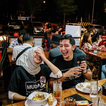 Young volunteers working on the campaign for Amira Aisya Abd Aziz, secretary-general of Malaysian United Democratic Alliance (MUDA). Photo: Bloomberg