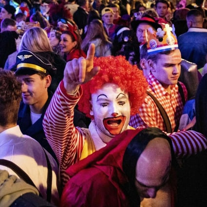 Partygoers enjoy a carnival in Eindhoven, the Netherlands, in late February, after the easing of pandemic rules. Photo: AFP