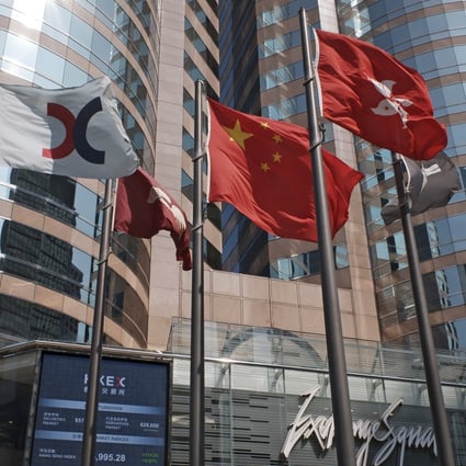 The Exchange Square building in Hong Kong. Research by brokerage China Renaissance suggests that about 80 of the 250 Chinese companies listed in the US, representing 90 per cent of all ADRs’ market capitalisation, could satisfy the listing requirements of bourse operator HKEX. Photo: AP