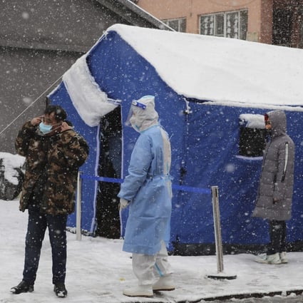 Residents queue in the snow for Covid-19 tests in Changchun, Jilin province, on Tuesday. Photo: AP
