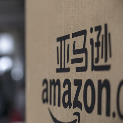 The icon of Amazon.cn seen on a box on May 22, 2016. Photo: Getty Images