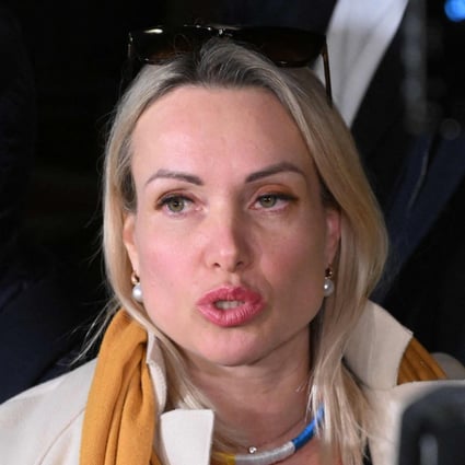 Marina Ovsyannikova, the journalist who protested against Russian military action in Ukraine during a live news broadcast, speaks to the media as she leaves the Ostankinsky District Court on Tuesday. Photo: AFP