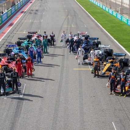 This season’s drivers pose on the grid during day one of testing in Bahrain. Photo: Formula One