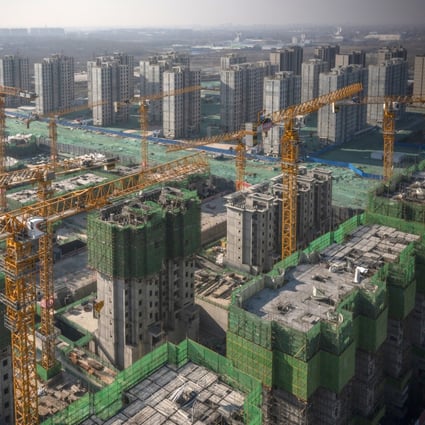 Unfinished apartment buildings at the construction site of a China Evergrande Group development in Beijing on January 6, 2021. Photo: Bloomberg