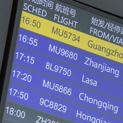 A flight information board shows a cancelled China Eastern Airlines flight at the Kunming Changshui International Airport on Monday. Photo: AFP