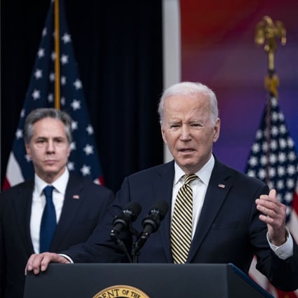 US President Joe Biden speaks as US Secretary of State Antony Blinken listens to Biden outlining America’s assistance to Ukraine. Photo: Bloomberg