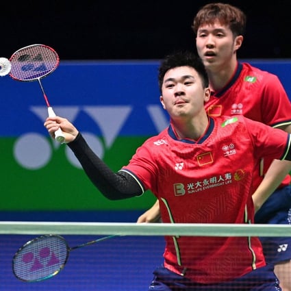 Tan Qiang (left) and He Jiting of the Chinese team in a men’s doubles semi-final game against Mohammad Ahsan and Hendra Setiawan of Indonesia at the All England Open Badminton Championship event in Birmingham. Photo: AFP   