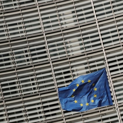 A European Union flag flutters outside the European Commission headquarters in Brussels, Belgium. Photo: Reuters