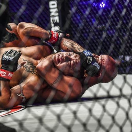Demetrious Johnson chokes out Rodtang at ONE X. Photos: ONE Championship
