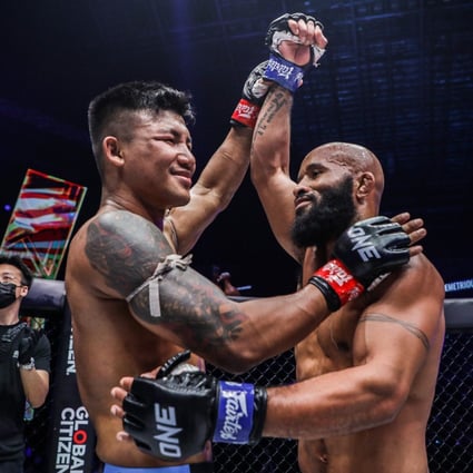 Rodtang congratulates Demetrious Johnson after their bout at ONE X. Photos: ONE Championship