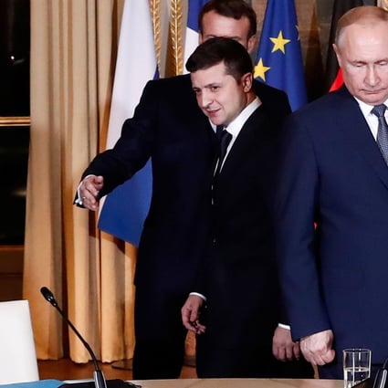 Ukrainian President Volodymyr Zelensky (L) and Russian President Vladimir Putin (R) arrive to attend a meeting on Ukraine with French President and German Chancelor at the Elysee Palace, on December 9, 2019 in Paris. Photo: Pool via AFP