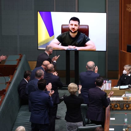 Ukrainian President Volodymyr Zelensky gets a standing ovation from the Australian Parliament on March 31. Photo: AFP