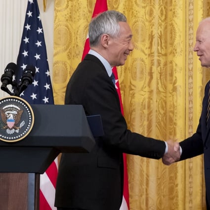 US President Joe Biden (R) and Prime Minister Lee Hsien Loong (L) of Singapore shake hands after making a joint press statement on Tueday. Photo: EPA-EFE