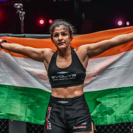 Ritu Phogat celebrates her ONE atomweight grand prix semi-final victory over Jenelyn Olsim.