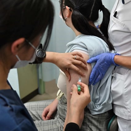 A 13-year-old student receives the HPV vaccine at a hospital in Tokyo. Photo: AFP