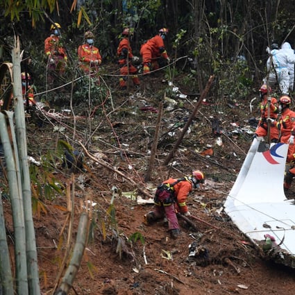 Rescuers at the site where a China Eastern plane crashed on March 21 in the Guangxi Zhuang region. Photo: Xinhua