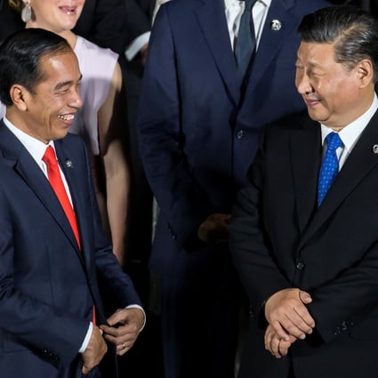 Indonesia’s President Joko Widodo speaks with China’s President Xi Jinping at the G20 summit in 2019. Photo: Reuters