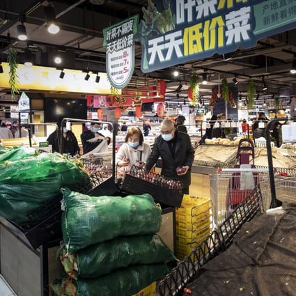 China’s economy is expected to grow by 5 per cent this year, down from a previous estimate of 5.4 per cent, it said, noting its government’s capacity to provide stimulus to offset adverse shocks. Photo: Bloomberg