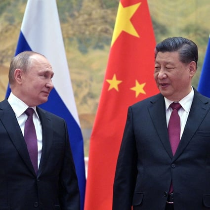 Russian President Vladimir Putin and Chinese President Xi Jinping meet in Beijing on February 4. Photo: TNS 