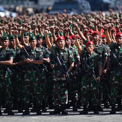 Indonesia debates whether the relatives of alleged PKI members should be allowed to join the country’s military. Photo: AFP