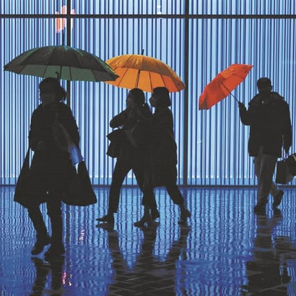 “Three Umbrellas” by street photographer Chae Kyung-wan, AKA K. Chae, one of the photos of South Korea’s capital that make up his “Not Seoul” exhibition. Photo: Courtesy of K. Chae.