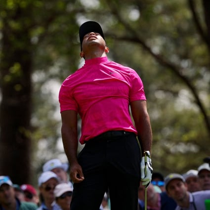 Tiger Woods reacts after his tee shot on the 4th during the first round of the Masters. Photo: Reuters