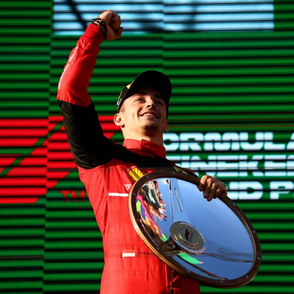 Ferrari’s Charles Leclerc celebrates on the podium after winning the 2022 Australian Grand Prix. Photo: Reuters/Martin Keep