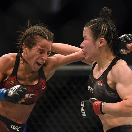 Zhang Weili (right) battles against Joanna Jedrzejczyk en route to a split decision win at T-Mobile Arena on March 7, 2020 in Las Vegas, Nevada. Photo: Harry How/Getty Images/AFP
