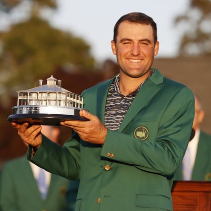 Scottie Scheffler holds the Masters trophy during the green jacket ceremony after winning the 2022 Masters Tournament. Photo: EPA-EFE
