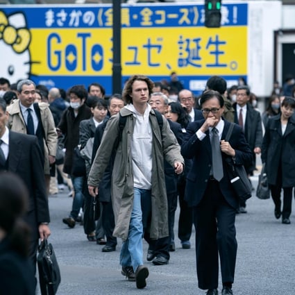 Ansel Elgort in a still from new HBO series Tokyo Vice, based on Jake Adelstein’s memoir Tokyo Vice: An American Reporter on the Police Beat in Japan.
